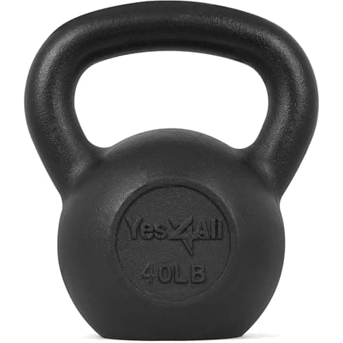 Black kettlebells on a textured gym floor